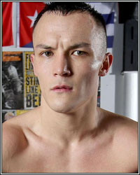 JOSH WARRINGTON VACATES IBF TITLE; TARGETS GARY RUSSELL JR. AND XU CAN